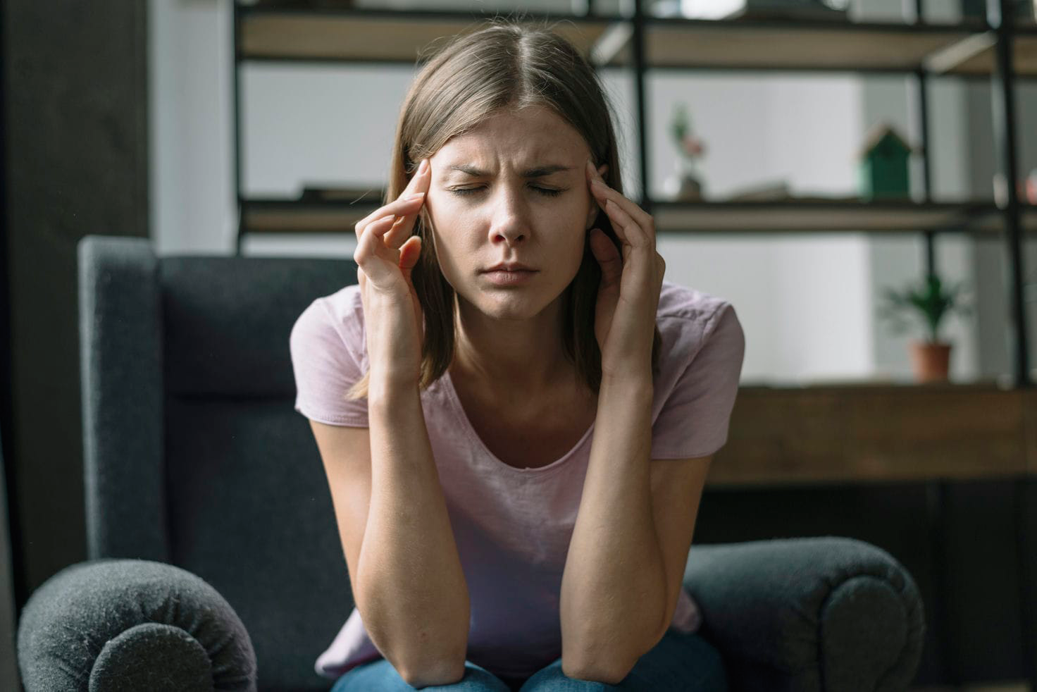 Informational image with title text 'Does Radon Cause Headaches' questioning whether radon gas exposure can lead to headache symptoms as a health effect.